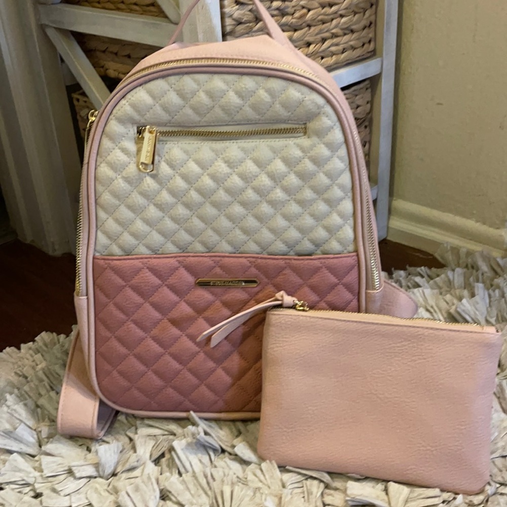 New Steve Madden backpack with mini makeup bag.